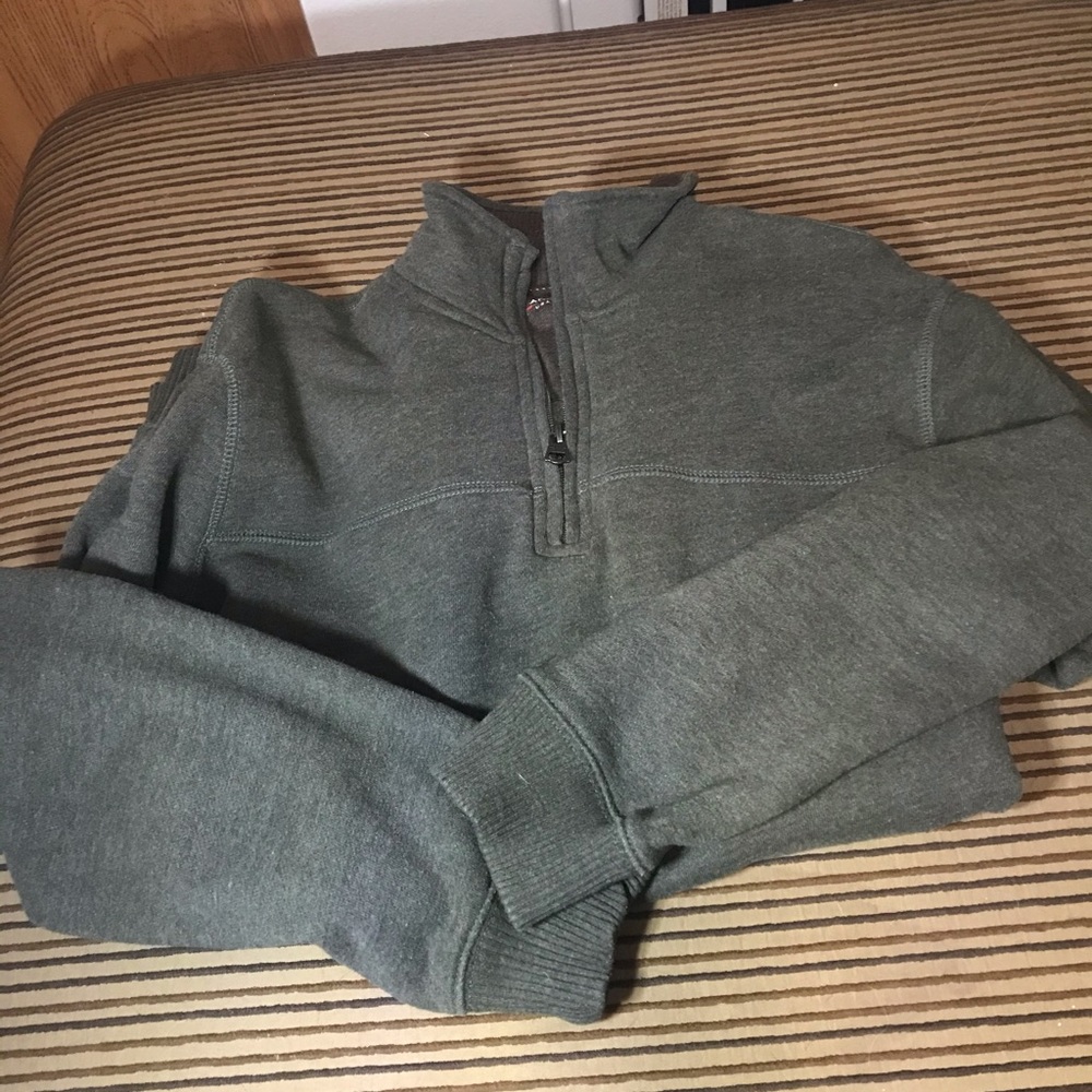 Green sweater. Quarter zip